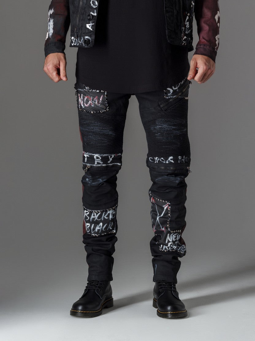 CD571 jeansy z farbą i napisami