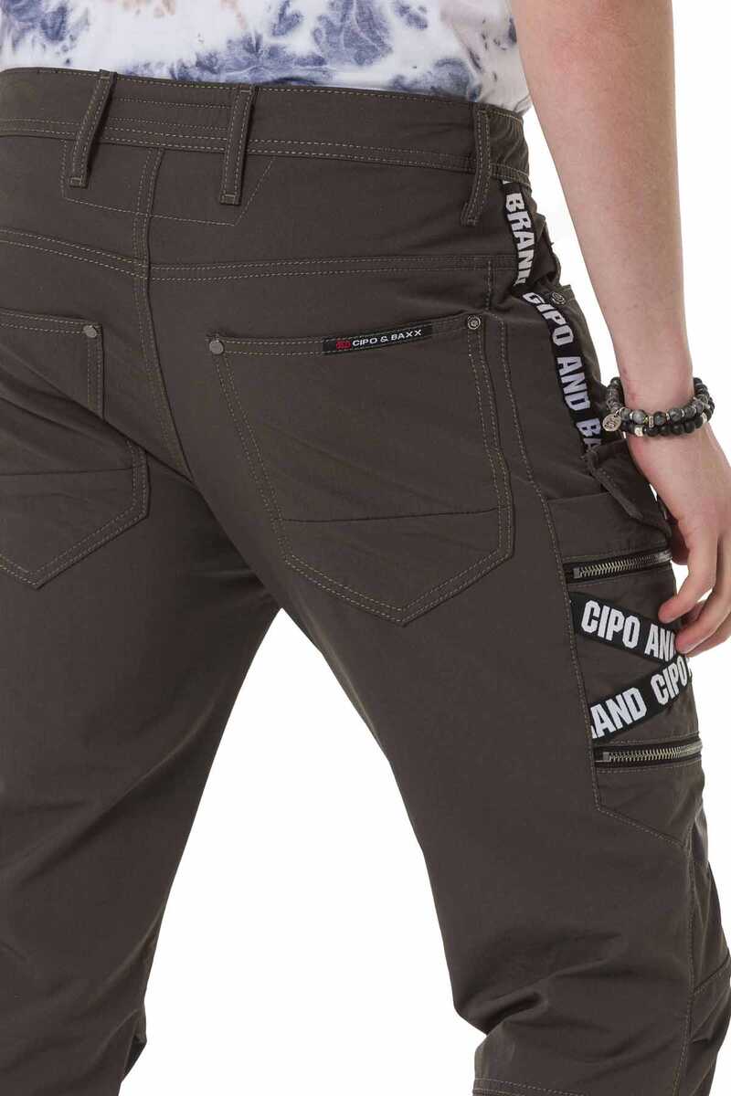 CD786 spodnie ze ściągaczami i ozdobnymi taśmami