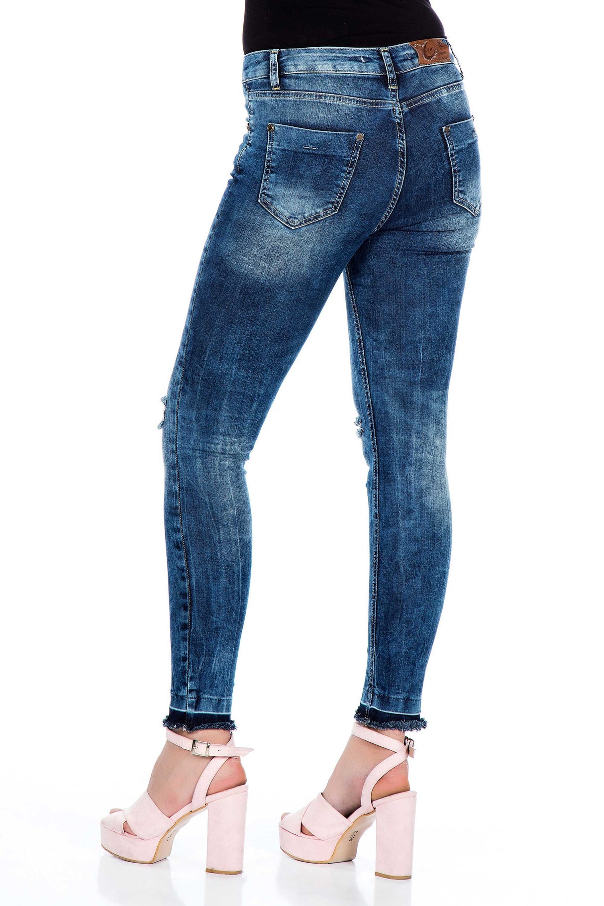 WD276 jeansy damskie slim fit z dziurami