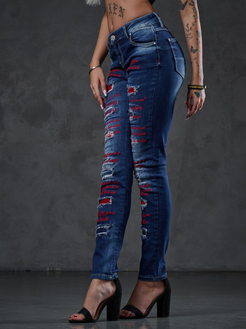 WD478 spodnie damskie z kolorowymi dziurami