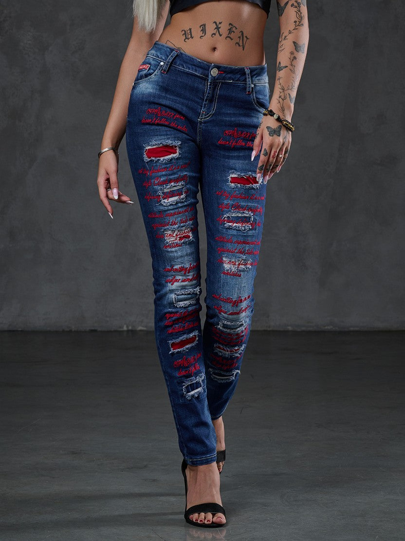 WD478 spodnie damskie z kolorowymi dziurami