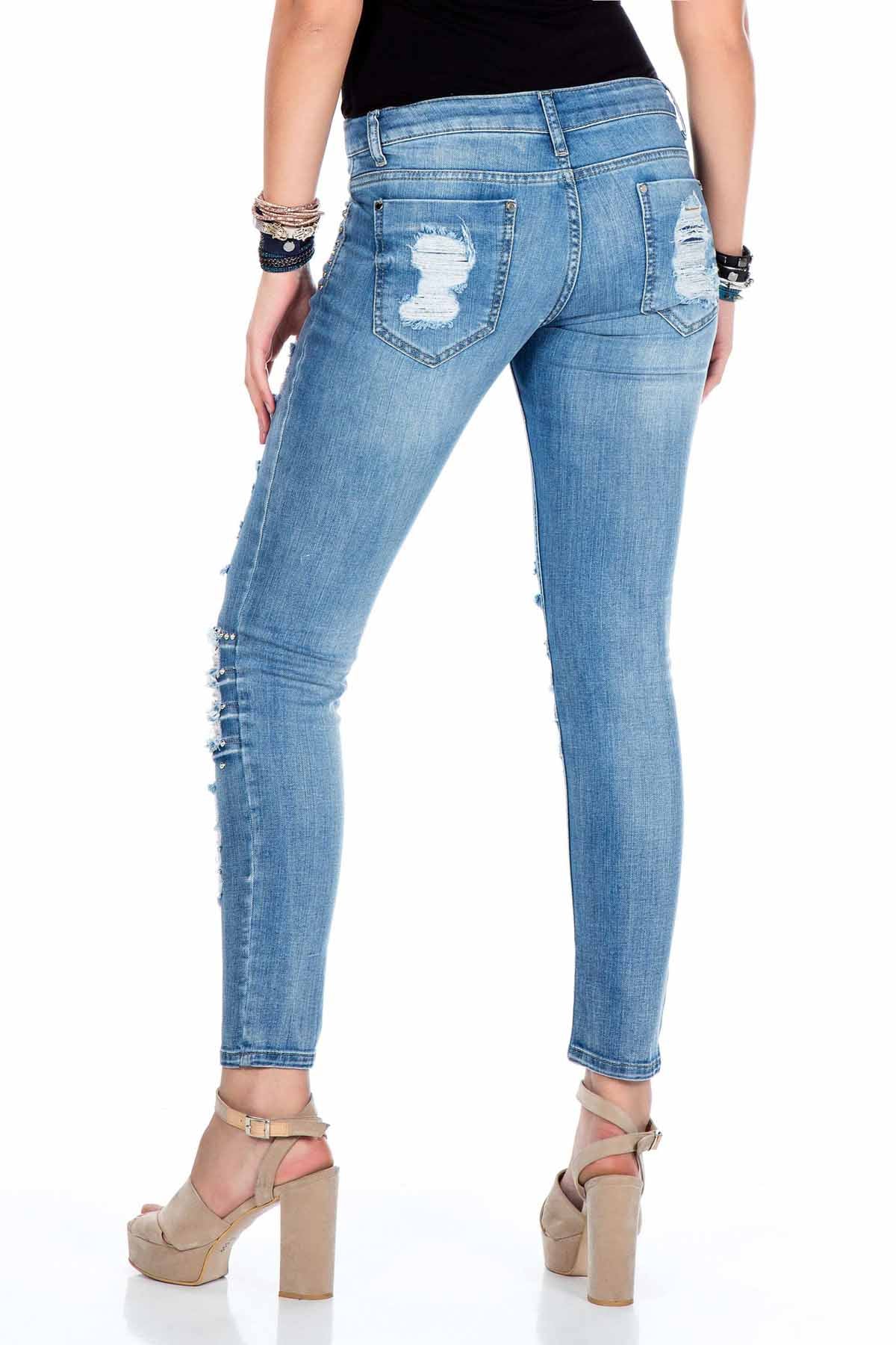 WD327 Mujeres jeans de ajuste delgado en una mirada de moda destruida